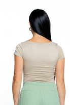 A fashionable women grey t-skirt and slim fit cargo jogger